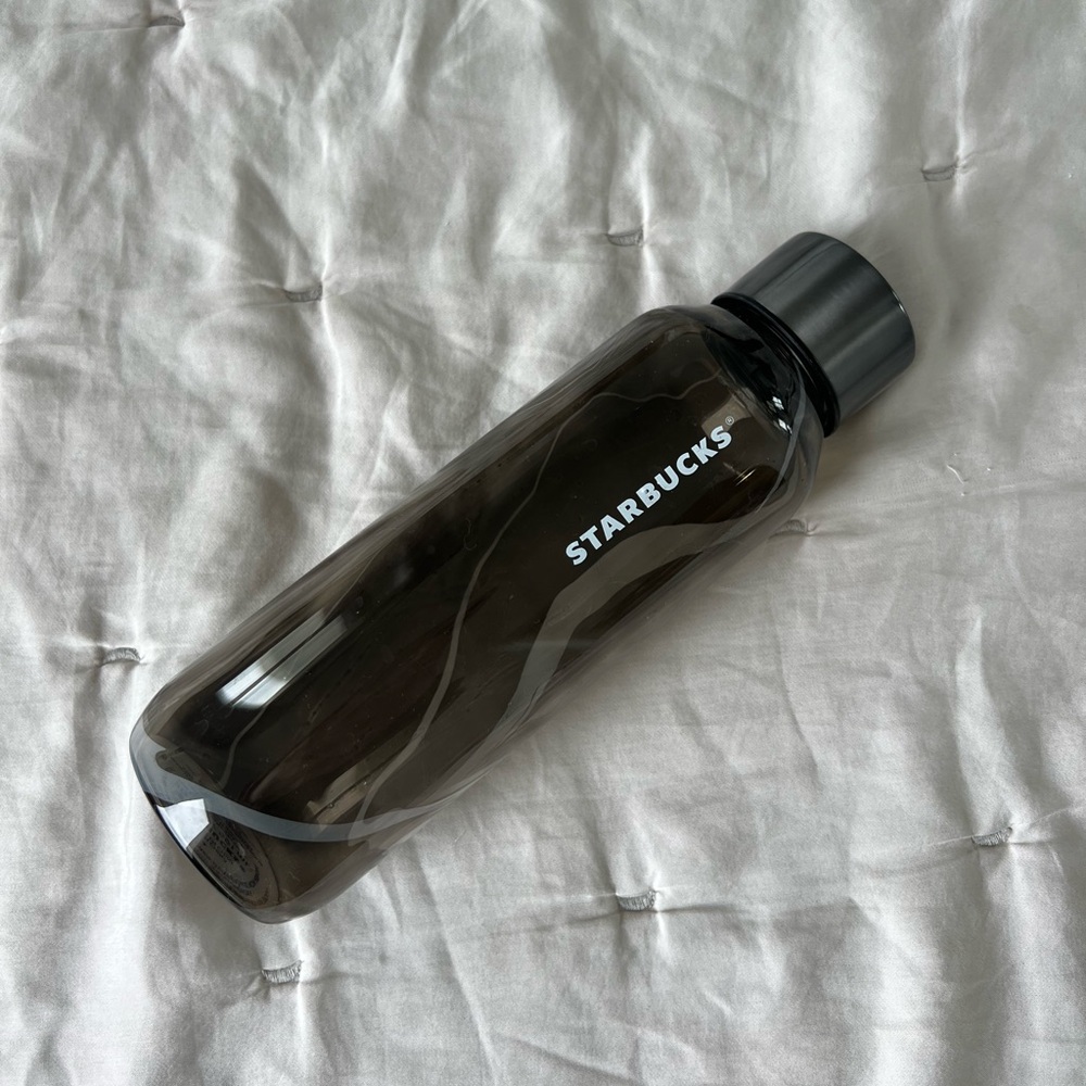 Starbucks 20 oz Recycled Glass Water Bottle with a gray marble wave design 2022